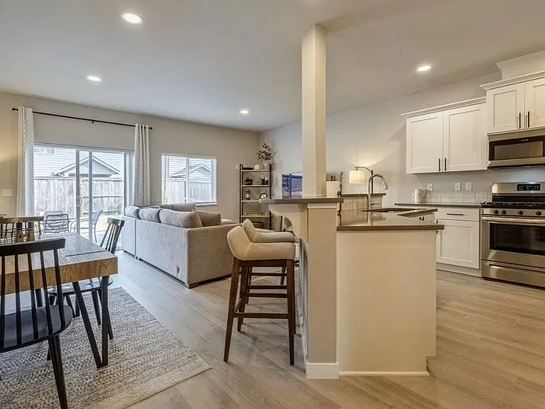open living, dinning, and kitchen area