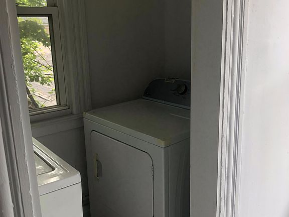 Right off the kitchen washer and dryer.