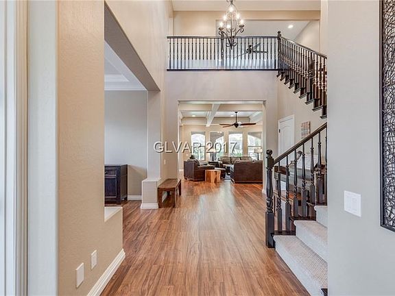 Impressive two story entry with grand staircase