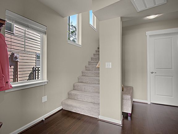 Lovely Entry with Hardwoods. 