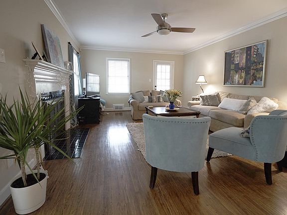 Living Room with Access to Sun Room. (Fire place does not work)