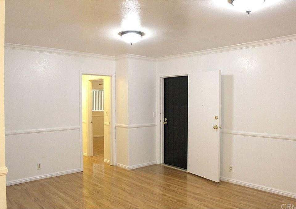 Black door is front door.
