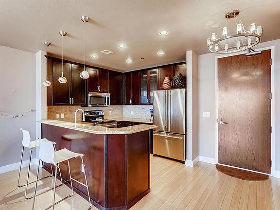 GOURMET ,EAT IN KITCHEN WITH ISLAND ,JENN AIR APPLIANCES, GRANITE COUNTERS