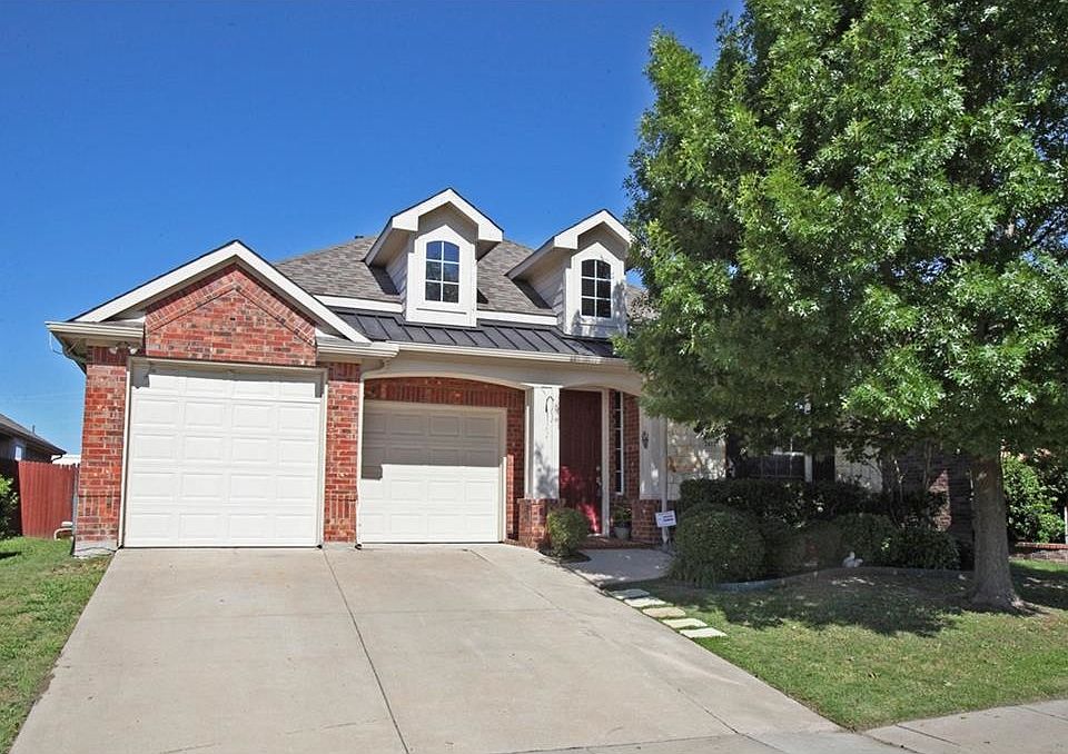 Appealing drive up. Extended garage on the left 24' long. 8'