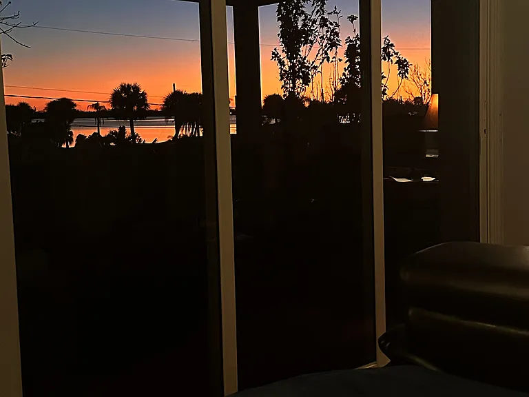Recline in bed and watch the golden colors of the sunset every night