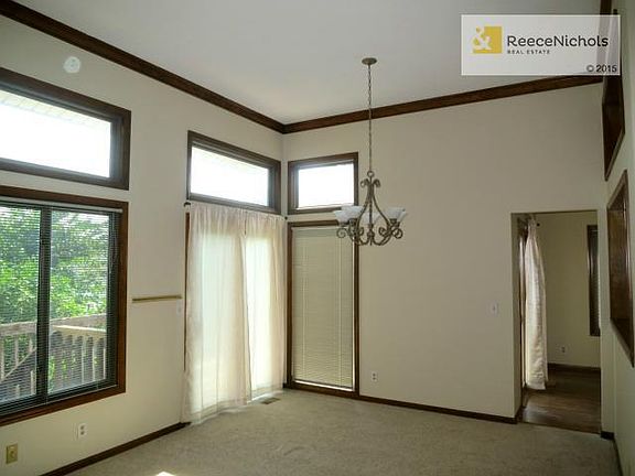 View of Formal Dining with an Anderson Renewal Glass Window Slider Door and Windows...brand new siding too!