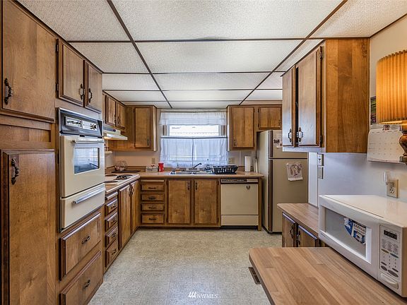 Kitchen with plenty counter space and cabinetry. 