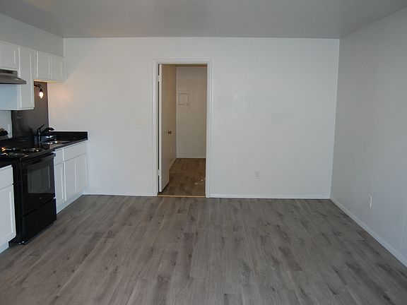 The door shows the entrance to the bedroom.