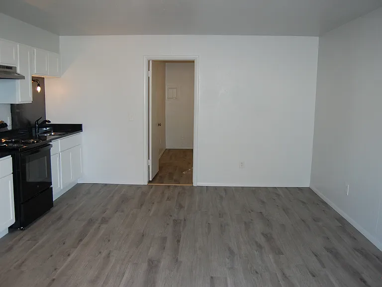 The door shows the entrance to the bedroom.