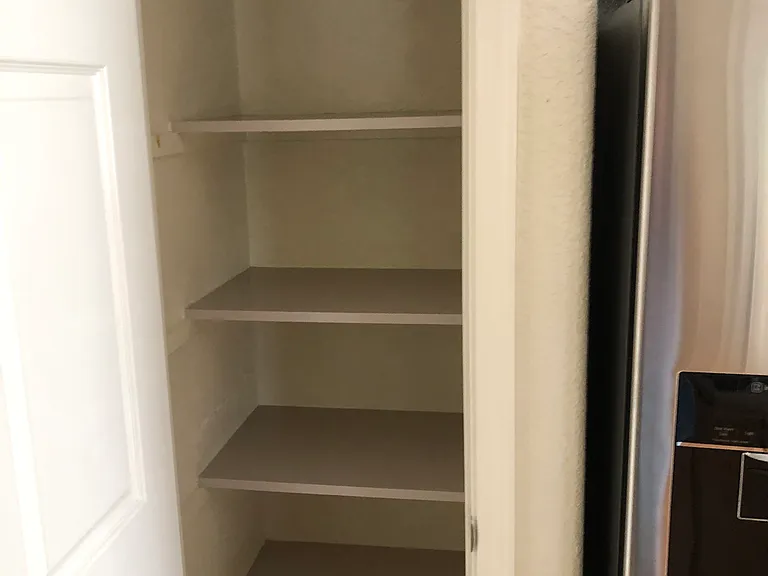 Kitchen pantry for plenty of food storage.