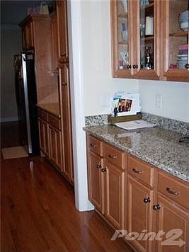Sensational Butler's Pantry with Granite Counters and lots of Cabinets