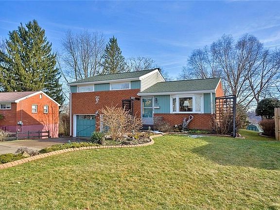 Larger than it looks this three bedroom two full bath home offers a convenient location and updates including newer HVAC & roof.