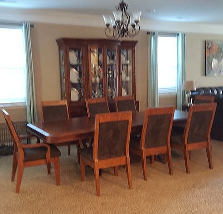 dining Room
						:
						This is a large table with 2 leaf inserts.