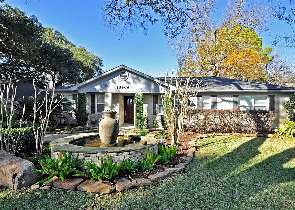 FRONT YARD IS PROFESSIONALLY LANDSCAPED WITH A FOUNTAIN!!!