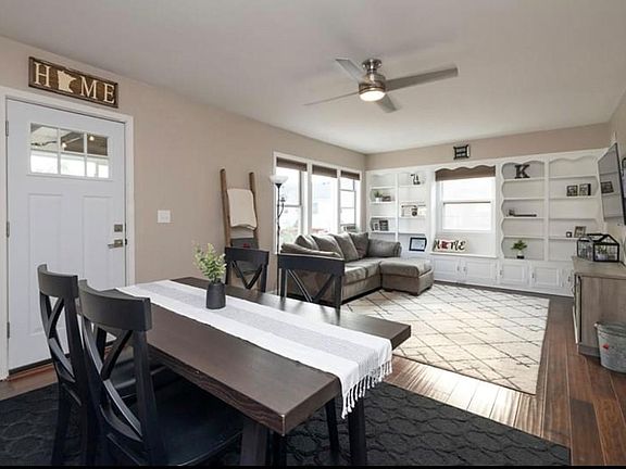 View from entry door of living room and dining room