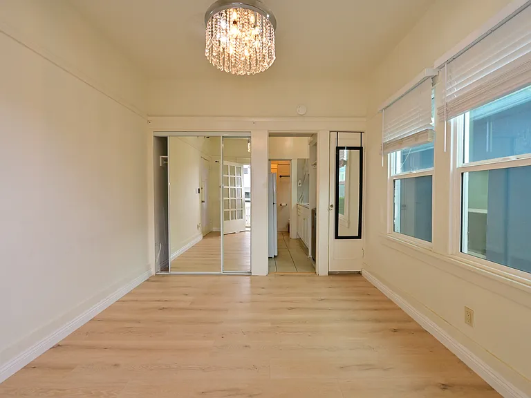 FULLY UPGRADED Studio + private balcony with Ocean view, New flooring, almost new everything, with in-unit laundry!