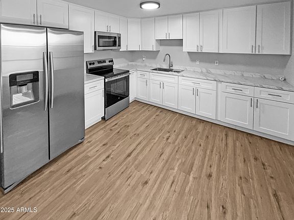 2nd image of 2223 N 62ND Lane