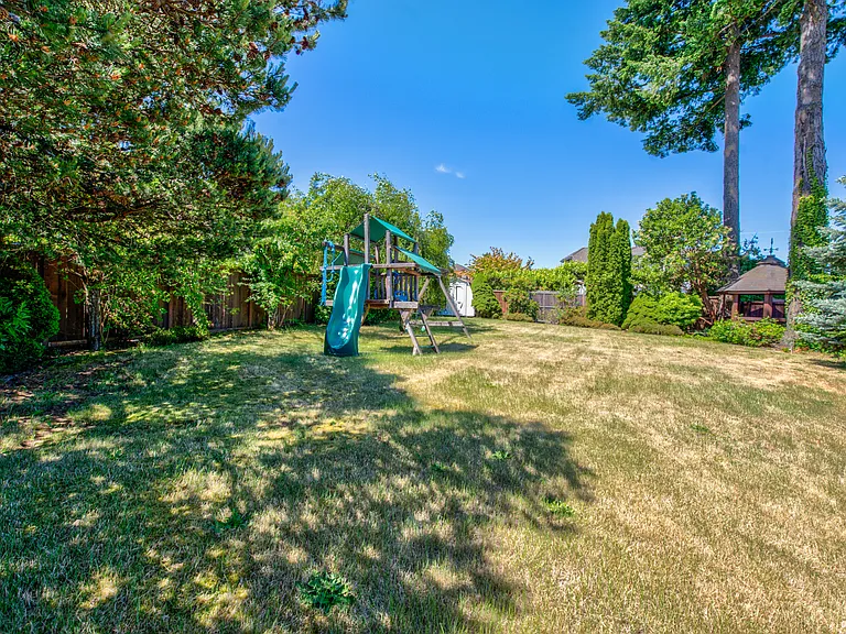 Private Playground in fully fenced Large Backyard