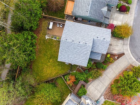 Fully fenced backyard that boarders the trail system.