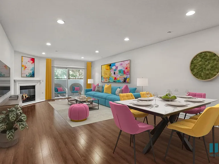 Open-Concept Dining, and Living Room, with Fireplace and Patio