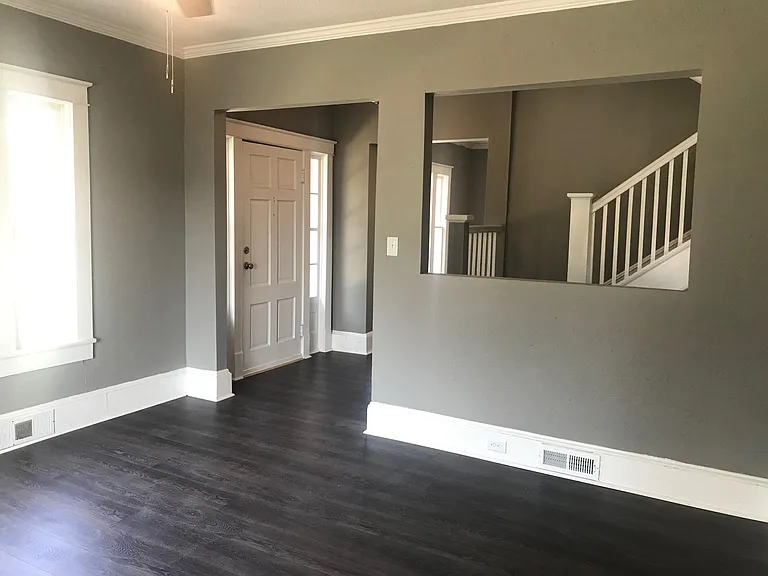 View of front entry foyer and living room.