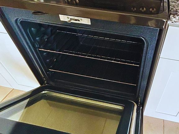 Modern electric stove and oven for home-cooked meals.