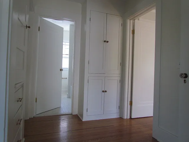 Upstairs hallway - Full length linen closets