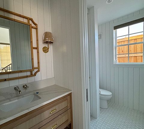 1st floor powder room/half bath in entryway