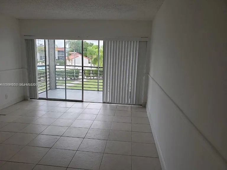 7435 Woodmont Ter #202 — Photo 12