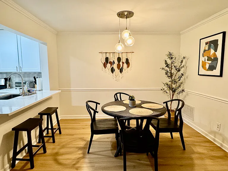 Dining area + eat in kitchen with bar stools