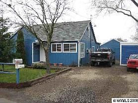 Front view with new 6mo. roof, 2 car detached drive-thru garage
