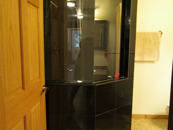 Large lower bath shower