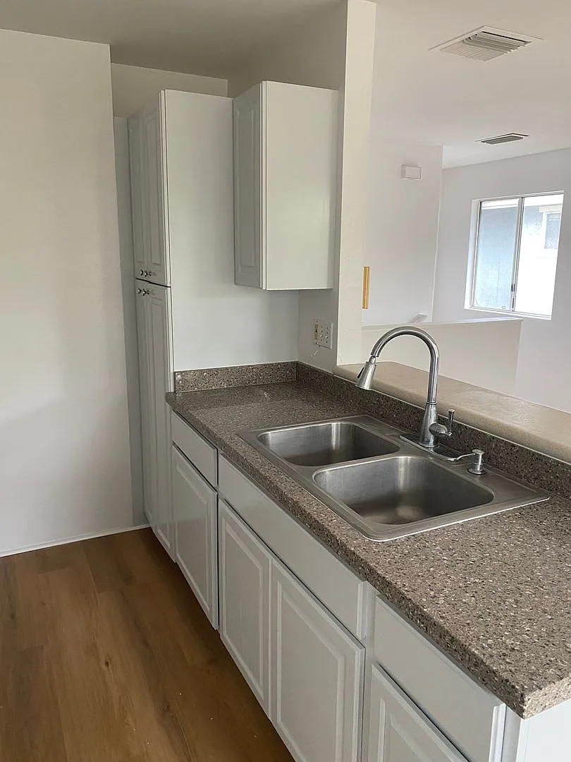 Updated 3 Bedroom, 2 Bath Pet Friendly Home with a Garage, Yard, and Central AC — Photo 1