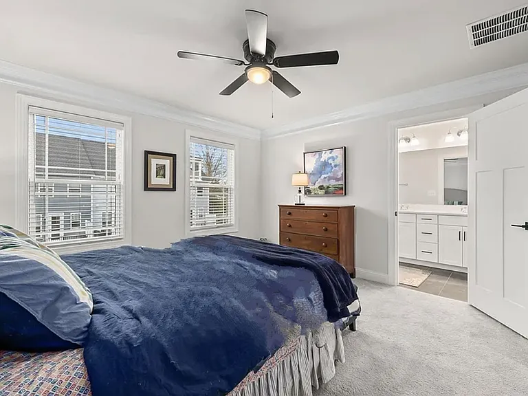 Primary bedroom suite, ceiling fan, en suite bath, dual-vanity, walkin-closet, crown molding, 2 windows w quality blinds.