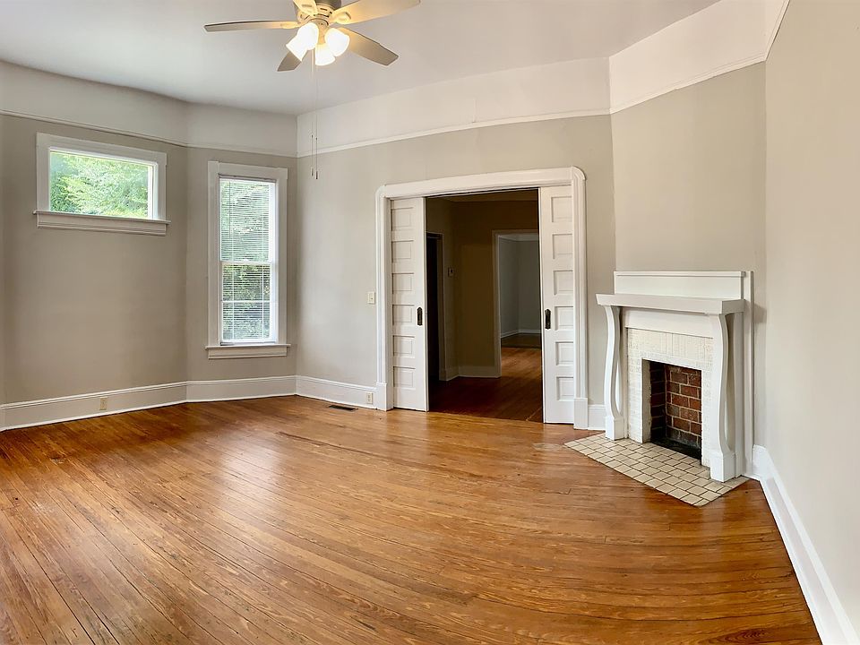 Gorgeous living room. Original pocket doors still work to divide front two bedrooms from Living room