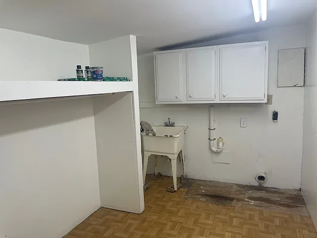 Large indoor utility room with washer/dryer hook ups