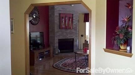 Great room and fireplace
						:
						View from foyer