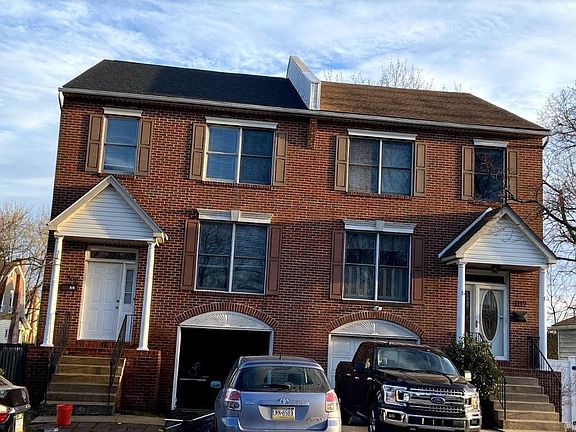 Outside view with new black roof tiles