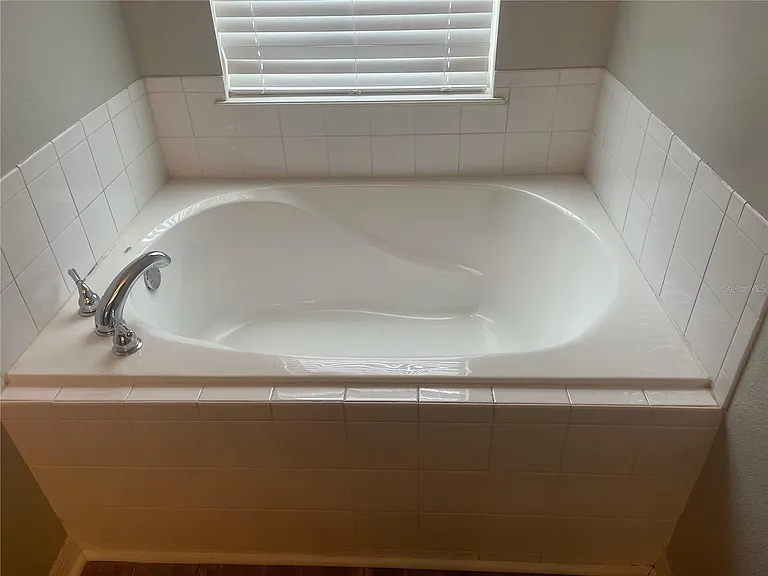 Primary Bathroom with soaker tub and stand alone shower