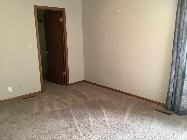 West bedroom upstairs with walk in closet and attached bath
