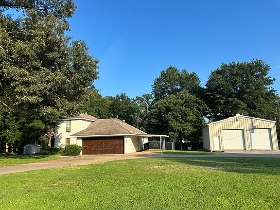 House, carport and shop