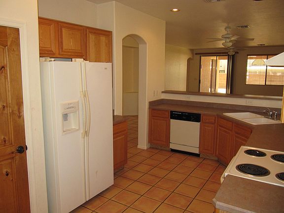 Roomy kitchen (with old appliances) looking into Great Room