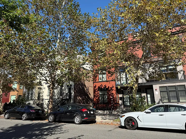 4 beautifully renovated buildings on the block.