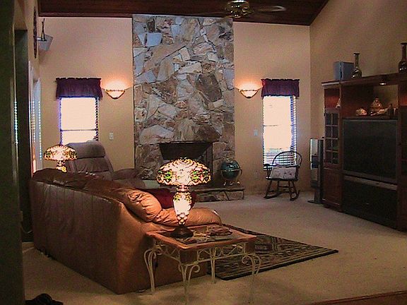 Living Room with one of two fireplaces