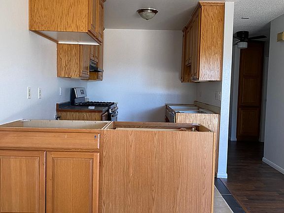 Looking into kitchen area from dining area.