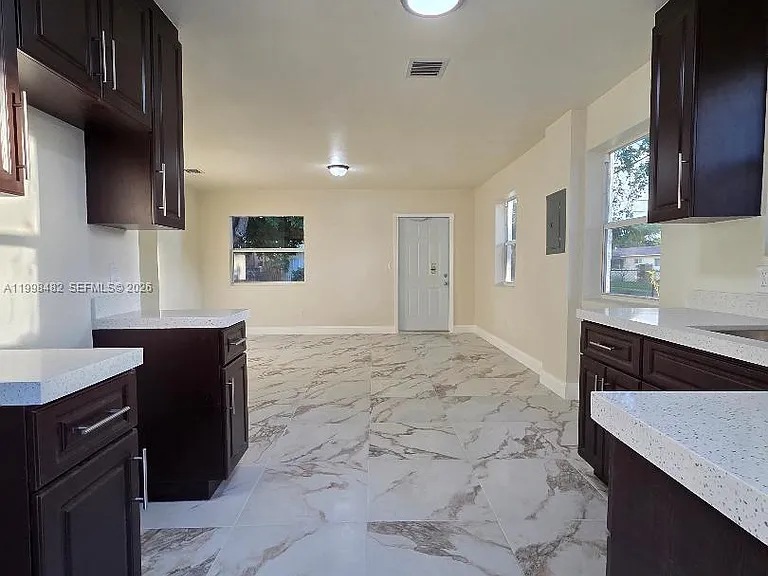 295 NW 48th St — Photo 6