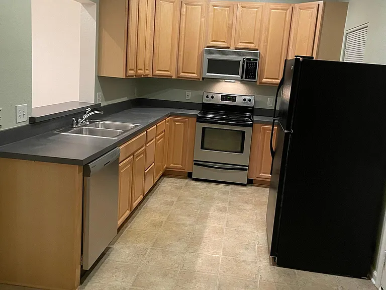 looking into kitchen from one end.