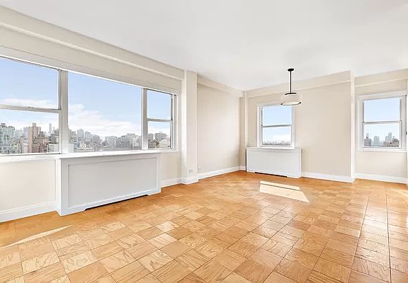 2nd image of 115 E 9th St APT 21E