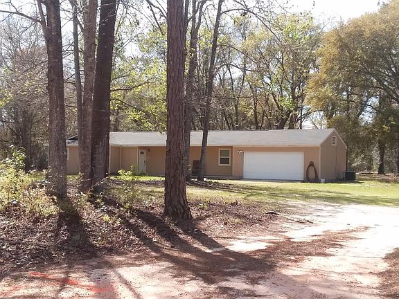 Front of house (beginning of driveway view)