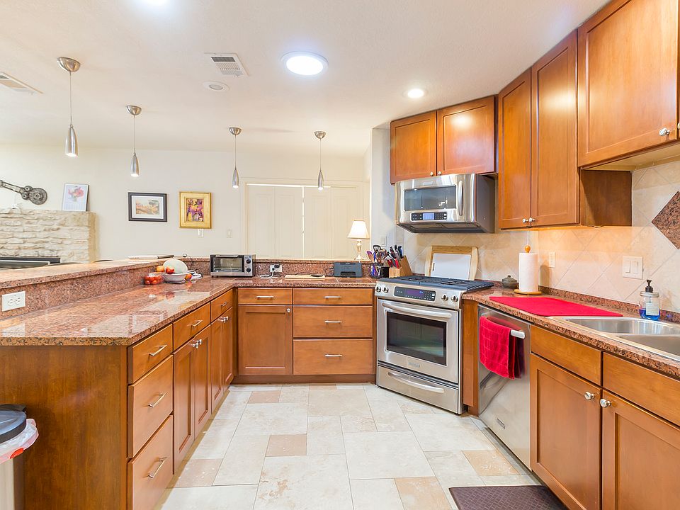 bright light in center is sky light. Disposal, over sink lighting, under counter lighting